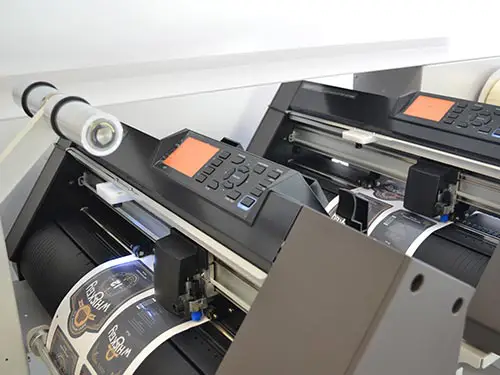 label finishing system with double plotter detail